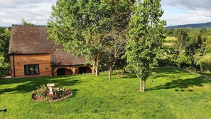 Property grounds - Lovely dog friendly cottage 4 miles from Ludlow with feature oak glass gable. (LUDLOW)