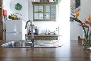 Apartment, 1 Bedroom (Sunny Duplex) | Private kitchen