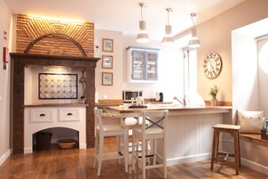 Apartamento, 1 quarto (Chimney Loft) | Cozinha privada | Geladeira, micro-ondas, cooktop, máquina de café expresso