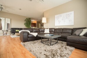 Condo | Living room | Flat-screen TV, DVD player - Lake View Penthouse Loft (Orlando)