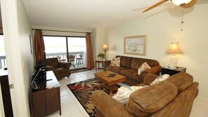 Condo | Living room | Flat-screen TV, fireplace, DVD player, toys - The Anna Maria Island Beach Palms 5B (Bradenton Beach)