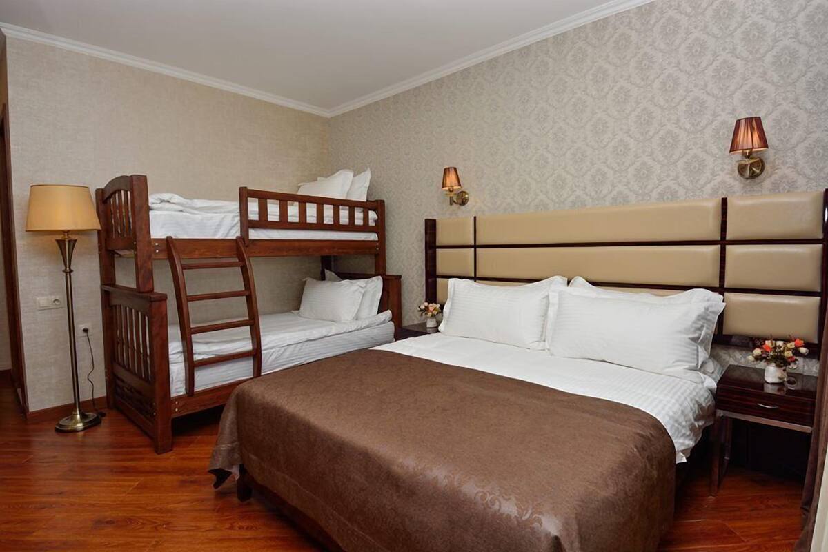 Comfort Quadruple Room | Individually furnished, desk, laptop workspace, soundproofing
