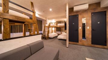 Family Suite Room | Desk, blackout drapes, soundproofing, iron/ironing board