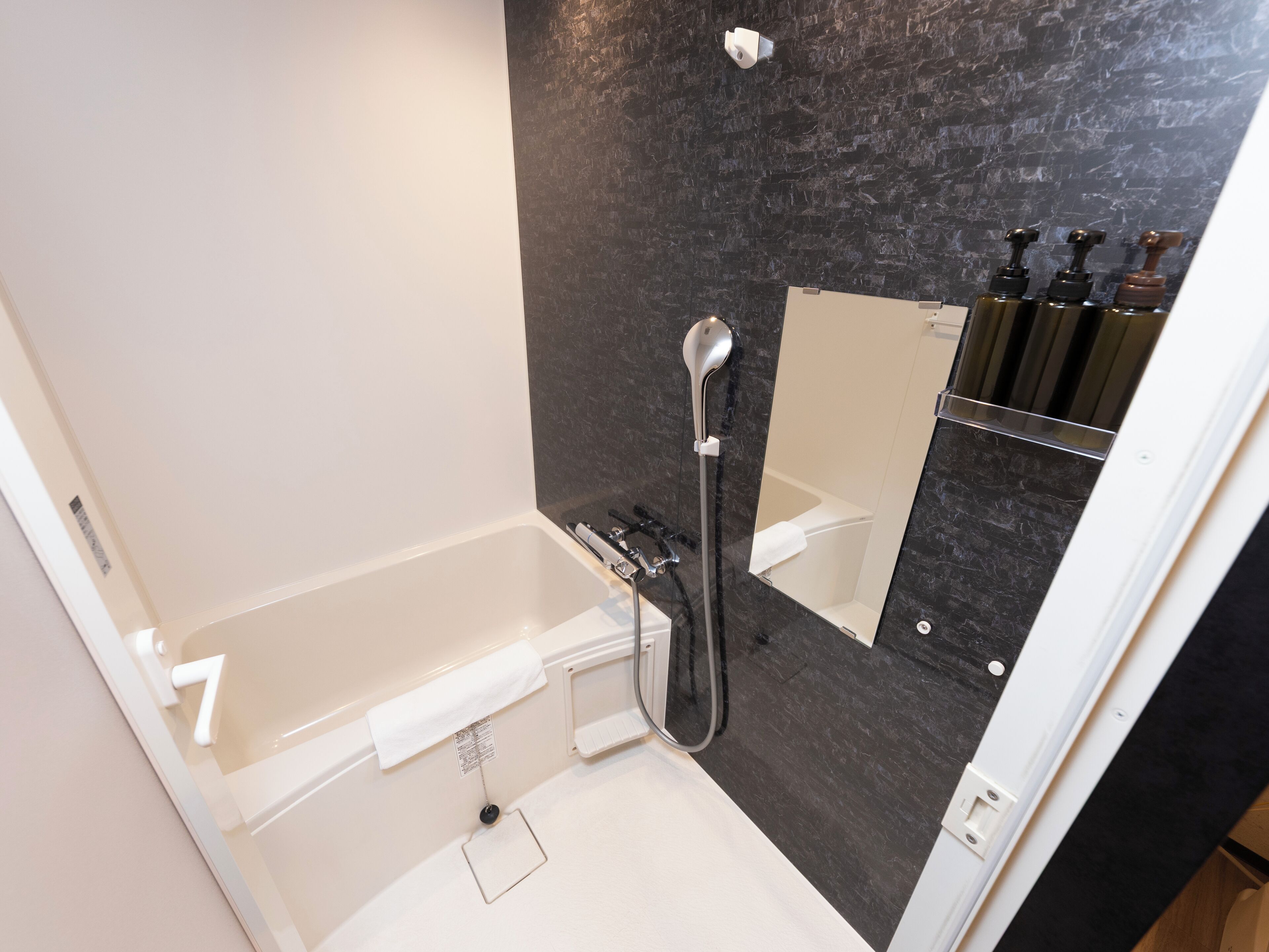 standard family room | bathroom | free toiletries, hair dryer, slippers, electronic bidet