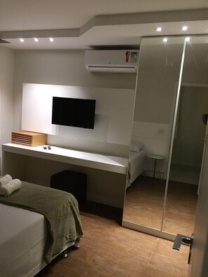 Apartamento luxo, 4 quartos | 4 quartos, Wi-Fi de cortesia