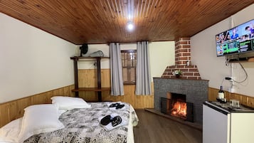 Quarto casal | Frigobar, cortinas blackout, Wi-Fi de cortesia, roupa de cama