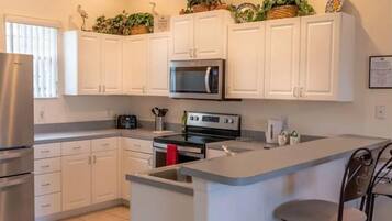 Villa | Private kitchen | Coffee/tea maker, electric kettle, toaster, highchair