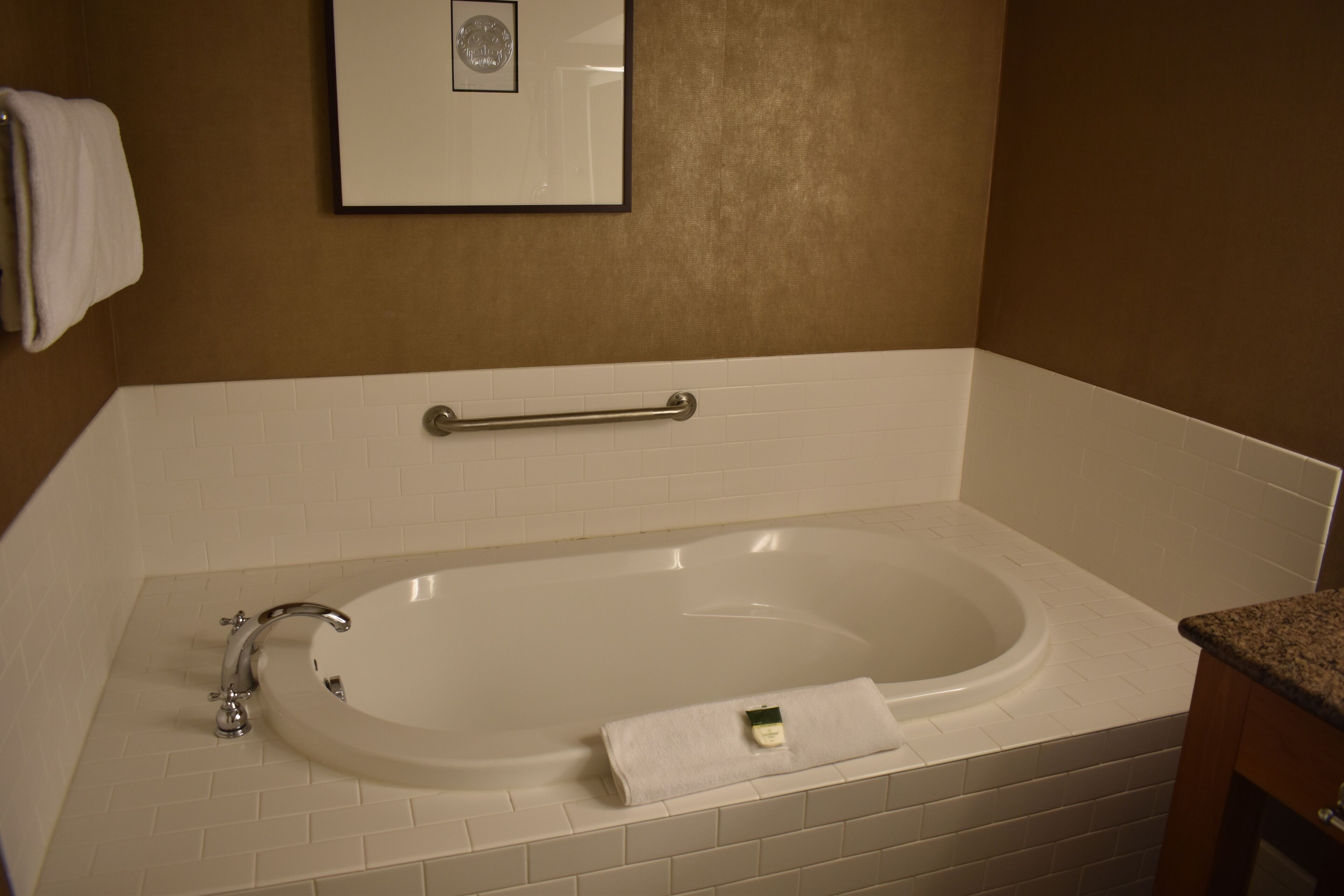 separate bathtub and shower, deep-soaking bathtub, rainfall showerhead