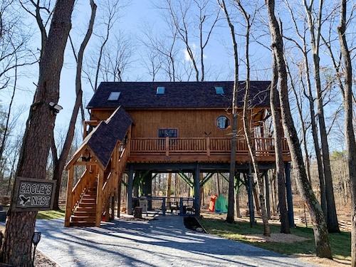 Relax and get away in the tree tops in our Eagle's Nest Tree House