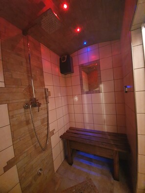 Combined shower/bathtub, jetted bath, hair dryer, bathrobes