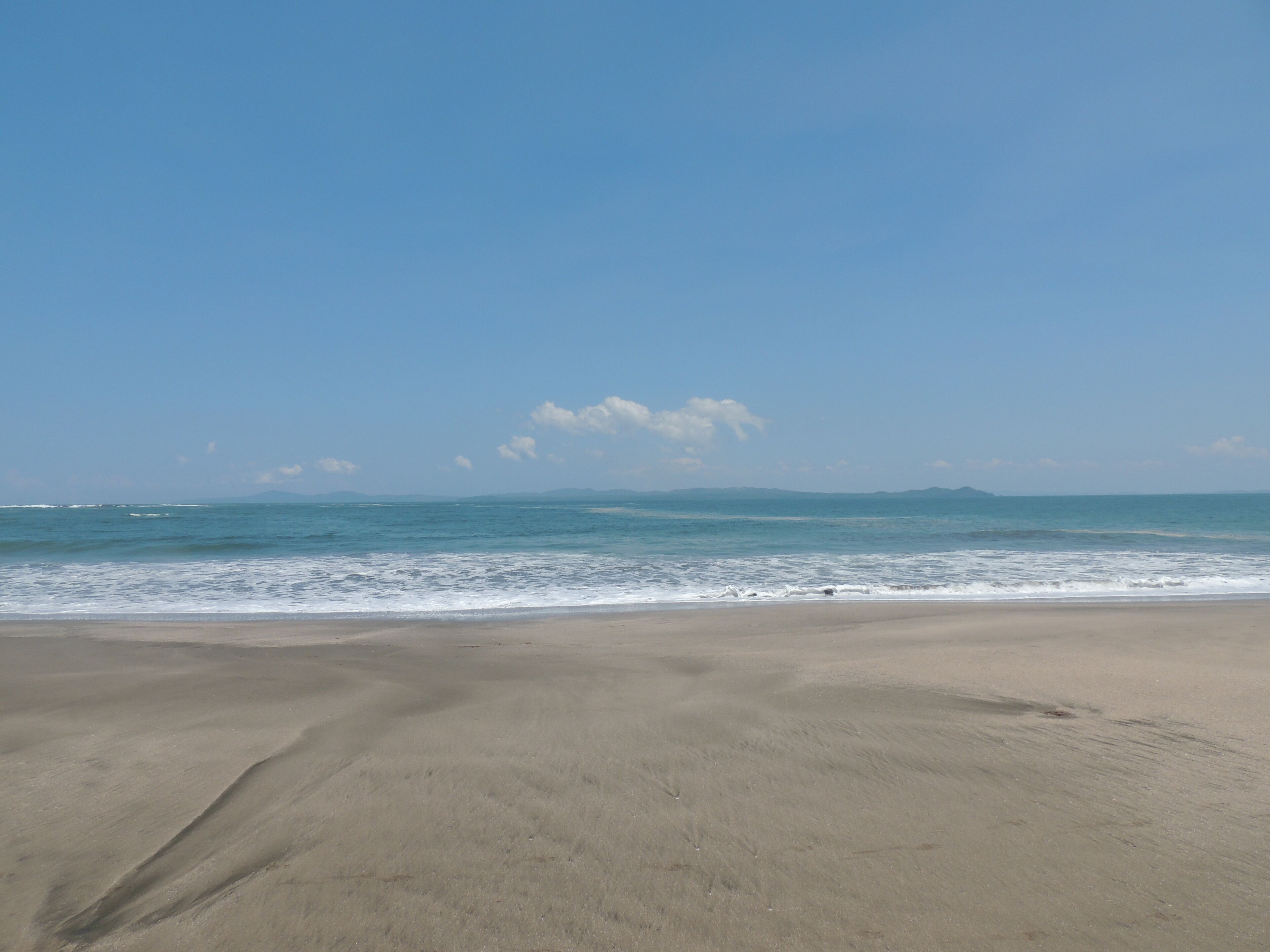 On the beach, sun loungers, beach towels