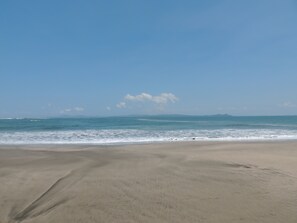 On the beach, sun loungers, beach towels - Beachfront Nature Rentals-Ocean/Pacific Beachfront Studio- 425 SQ. feet (Torio)