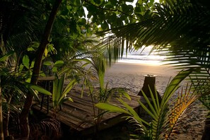 On the beach, sun loungers, beach towels