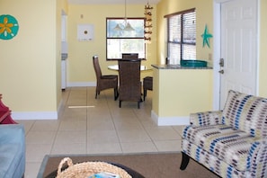 Condo | Living room | Flat-screen TV, fireplace - The Anna Maria Island Beach Castaway 1 (Holmes Beach)