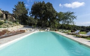 Seasonal outdoor pool, open 10:00 AM to 8:00 PM, sun loungers