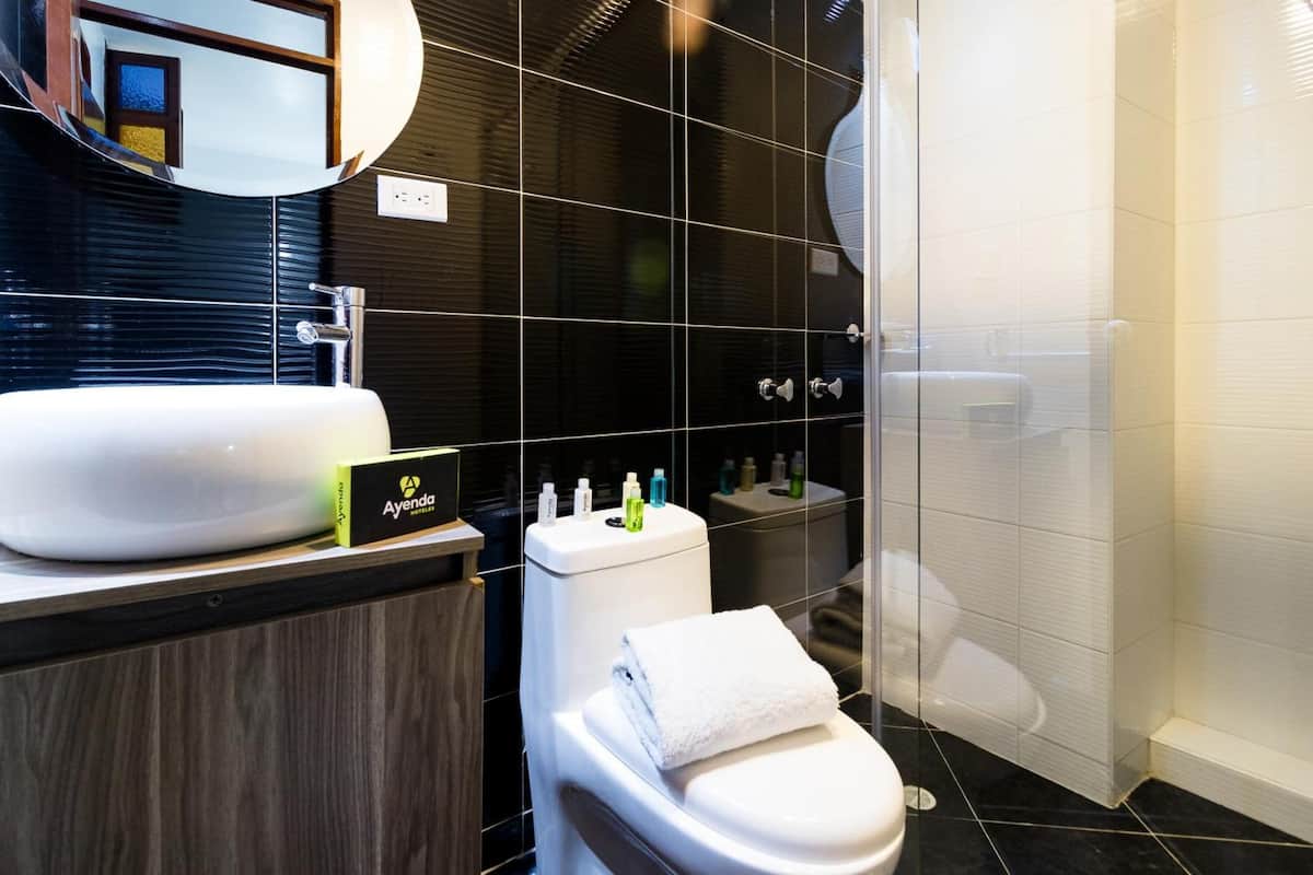 superior quadruple room | bathroom | shower, towels