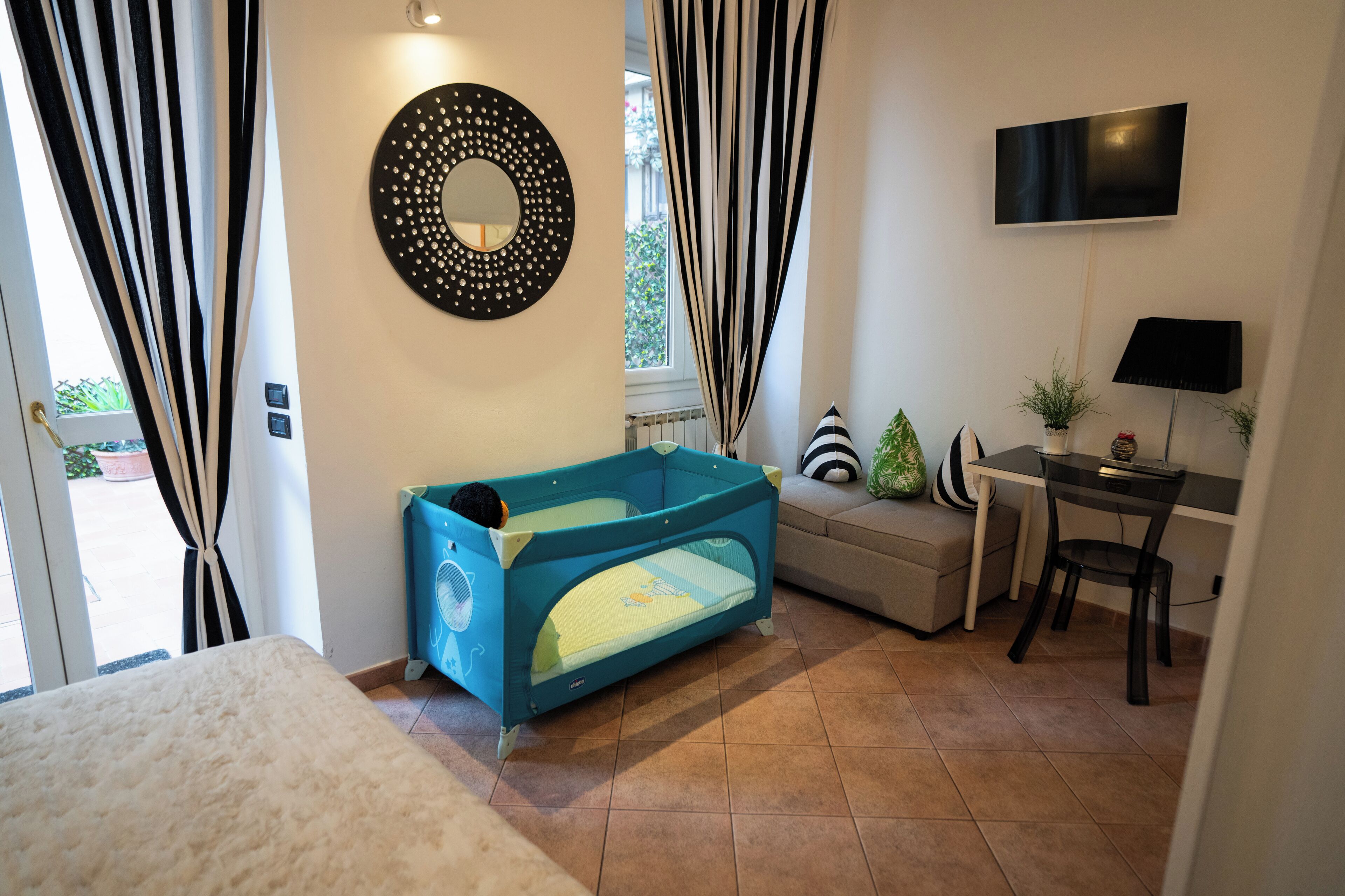 2 bedrooms, desk, iron/ironing board, travel crib