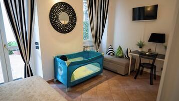 2 bedrooms, desk, iron/ironing board, travel crib