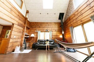 Family Cabin | Living area | 43-inch flat-screen TV with digital channels, TV, Netflix