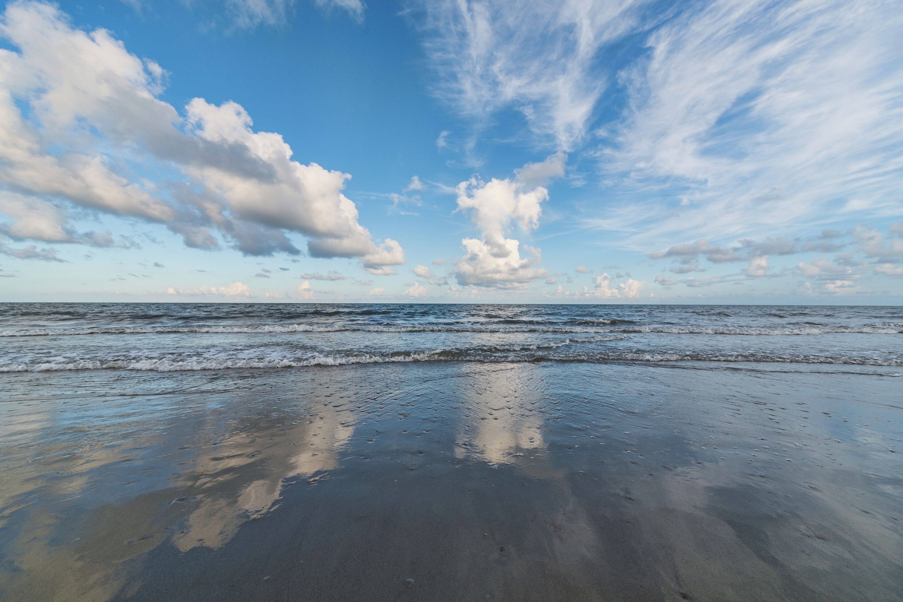 On the beach, sun-loungers, beach towels