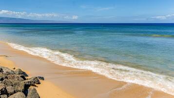 On the beach, sun loungers, beach towels