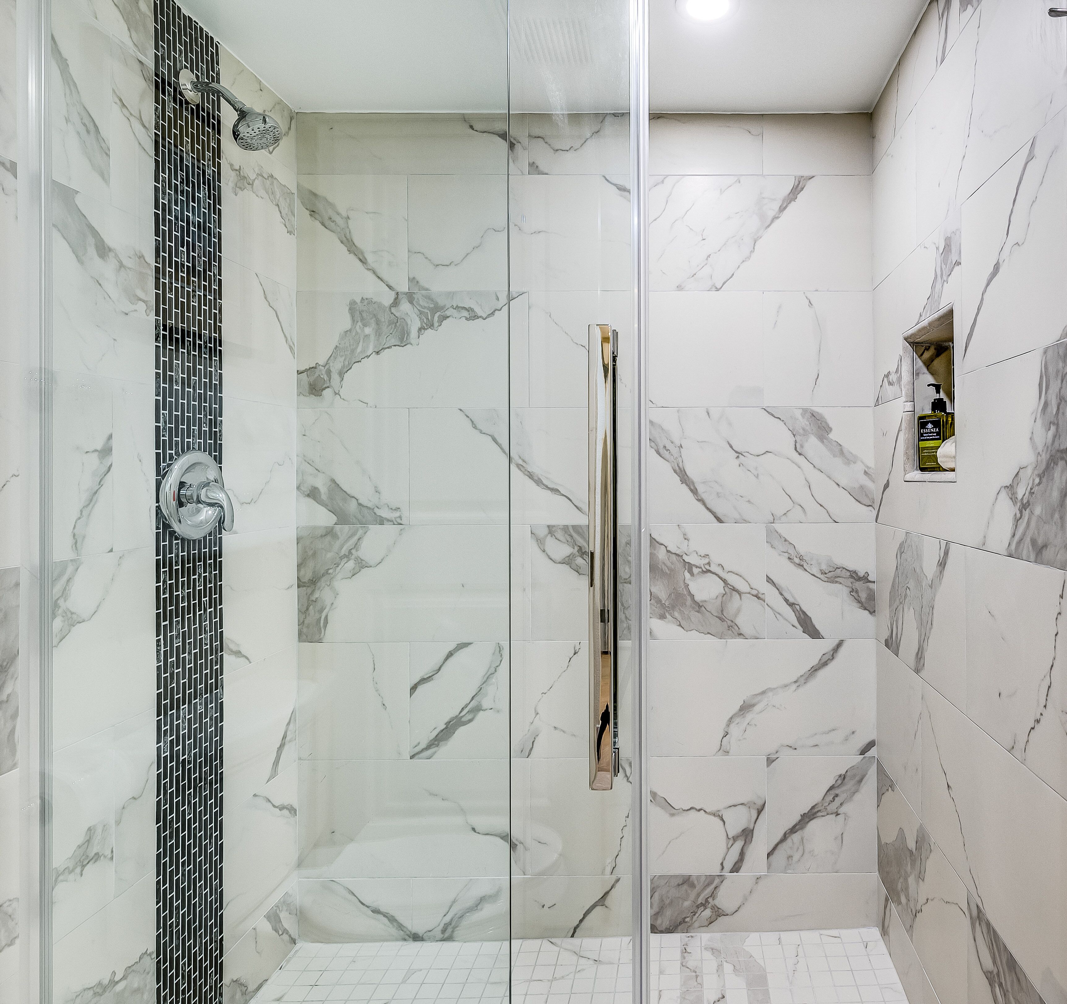 Combined shower/tub, hair dryer, towels, soap