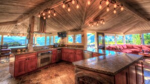 A spacious kitchen with granite countertops, stainless steel appliances, and a large island. - Lx16: Valley View Estate Above The Wineries With Hot Tub (Carmel Valley)