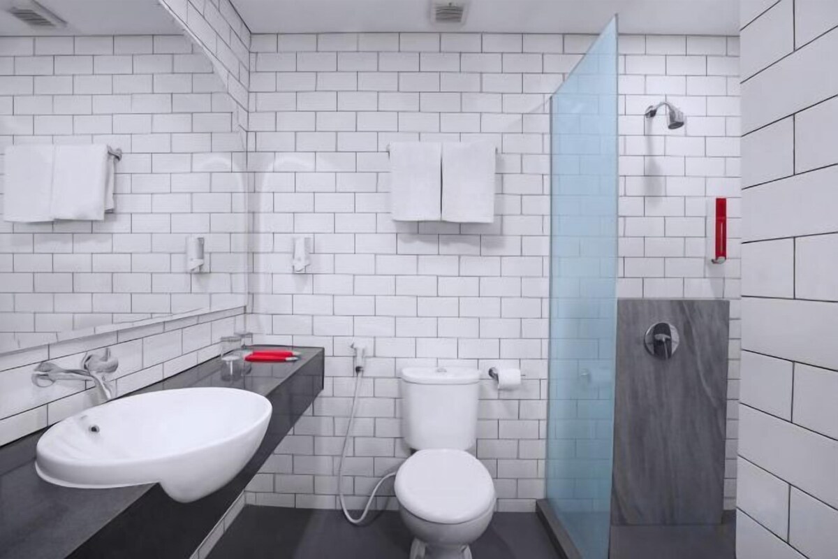 Shower, free toiletries, slippers, towels