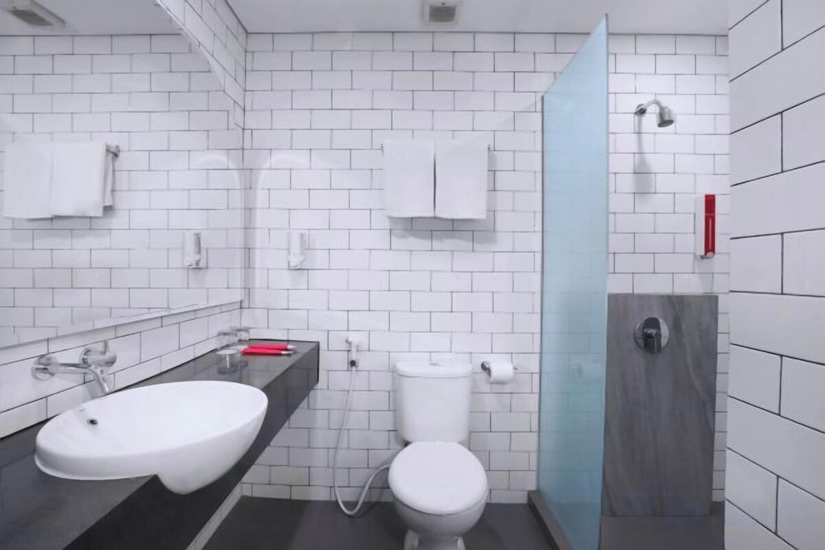 Bathroom | Shower, free toiletries, slippers, towels