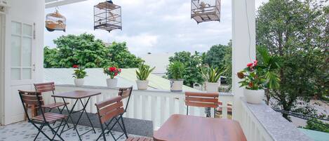 Standard Triple Room, City View | Terrace/patio