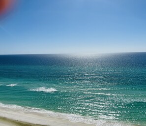 On the beach, sun-loungers