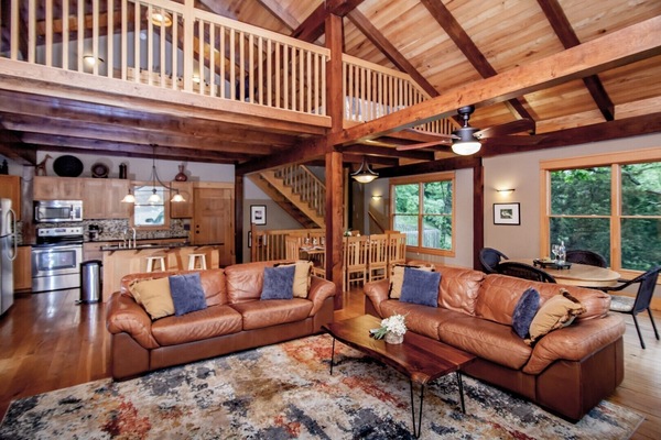 Living room with comfortable couches, cable t.v., and smart t.v.-WIFI in home.