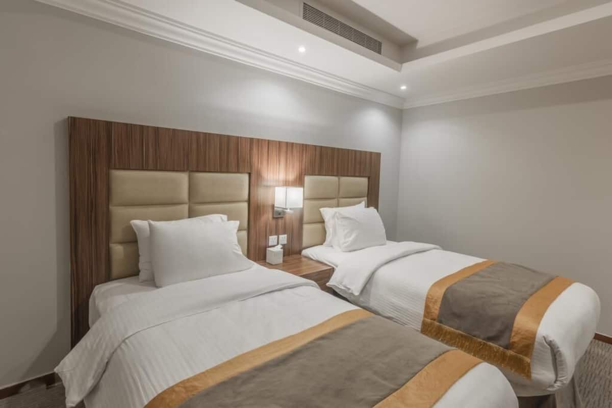 Familien-Suite | Minibar, Verdunkelungsvorhänge, schallisolierte Zimmer