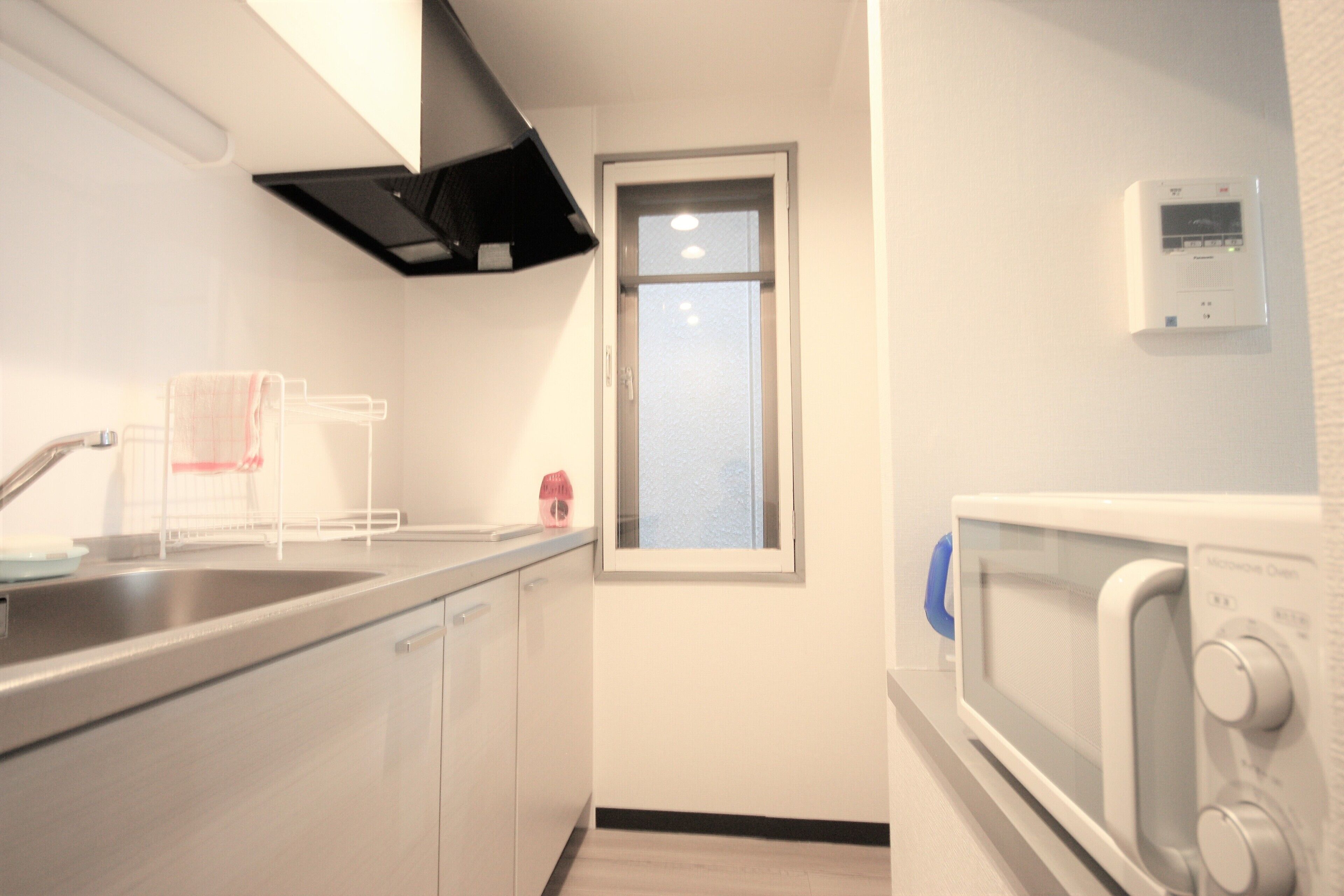 Departamento, 2 habitaciones | Cocina privada | Frigobar, microondas y utensilios de cocina 