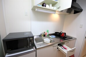 Apartment, 2 Bedrooms | Private kitchen | Full-size fridge, microwave, electric kettle, cookware/dishes/utensils