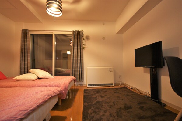 Apartment, 2 Bedrooms | Living area | Flat-screen TV, Netflix, streaming services