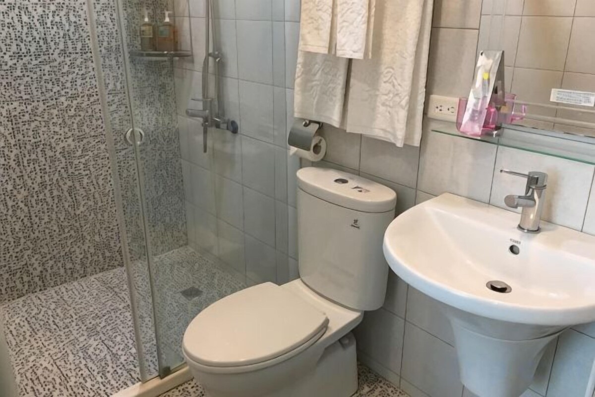 Bathroom | Shower, free toiletries, hair dryer, slippers