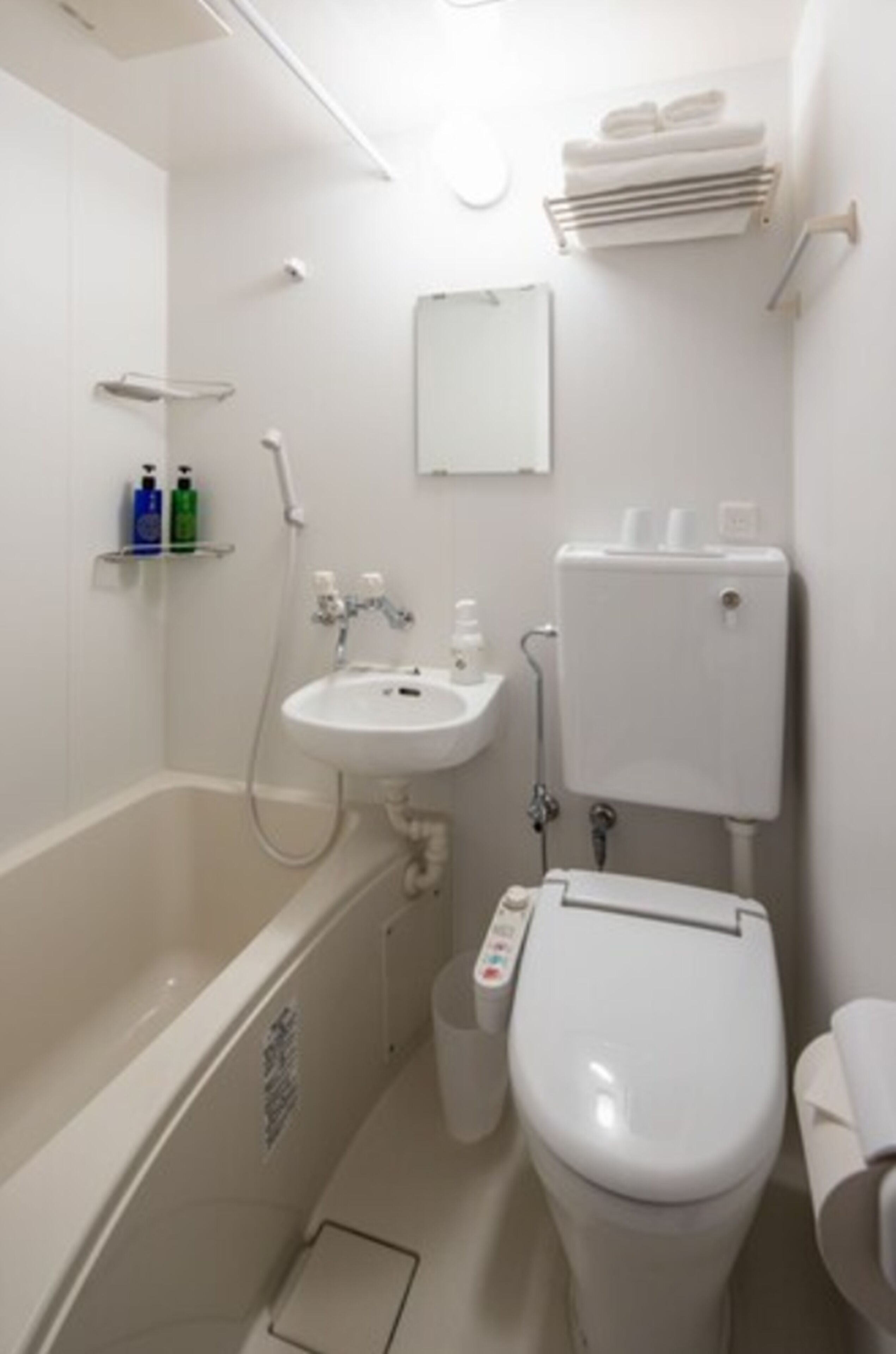 separate bathtub and shower, free toiletries, hair dryer, slippers
