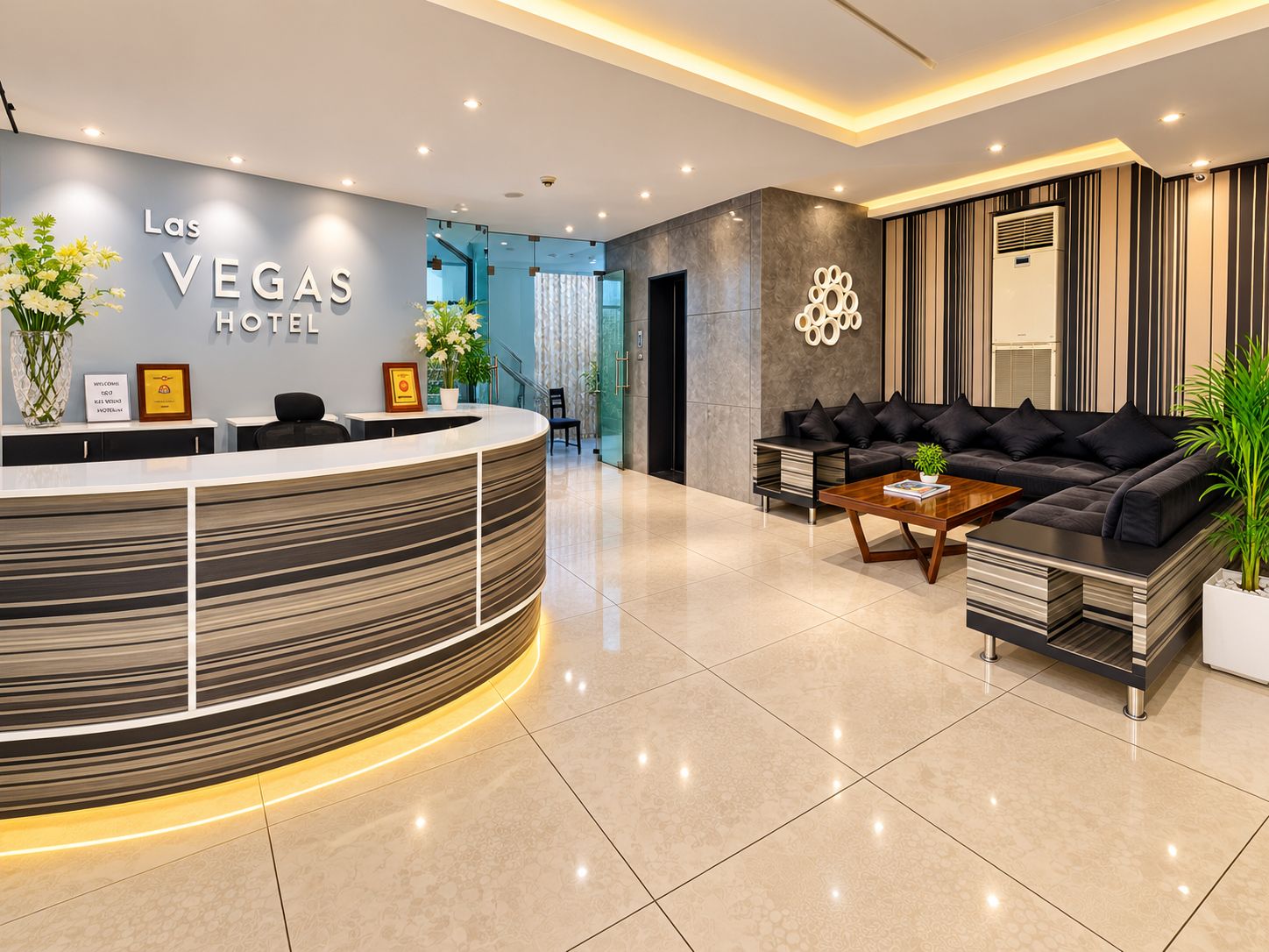 Un hall d’hôtel moderne avec un comptoir d’accueil, un canapé et une table basse.