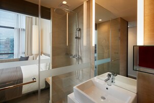 Designer toiletries, hair dryer, bathrobes, slippers