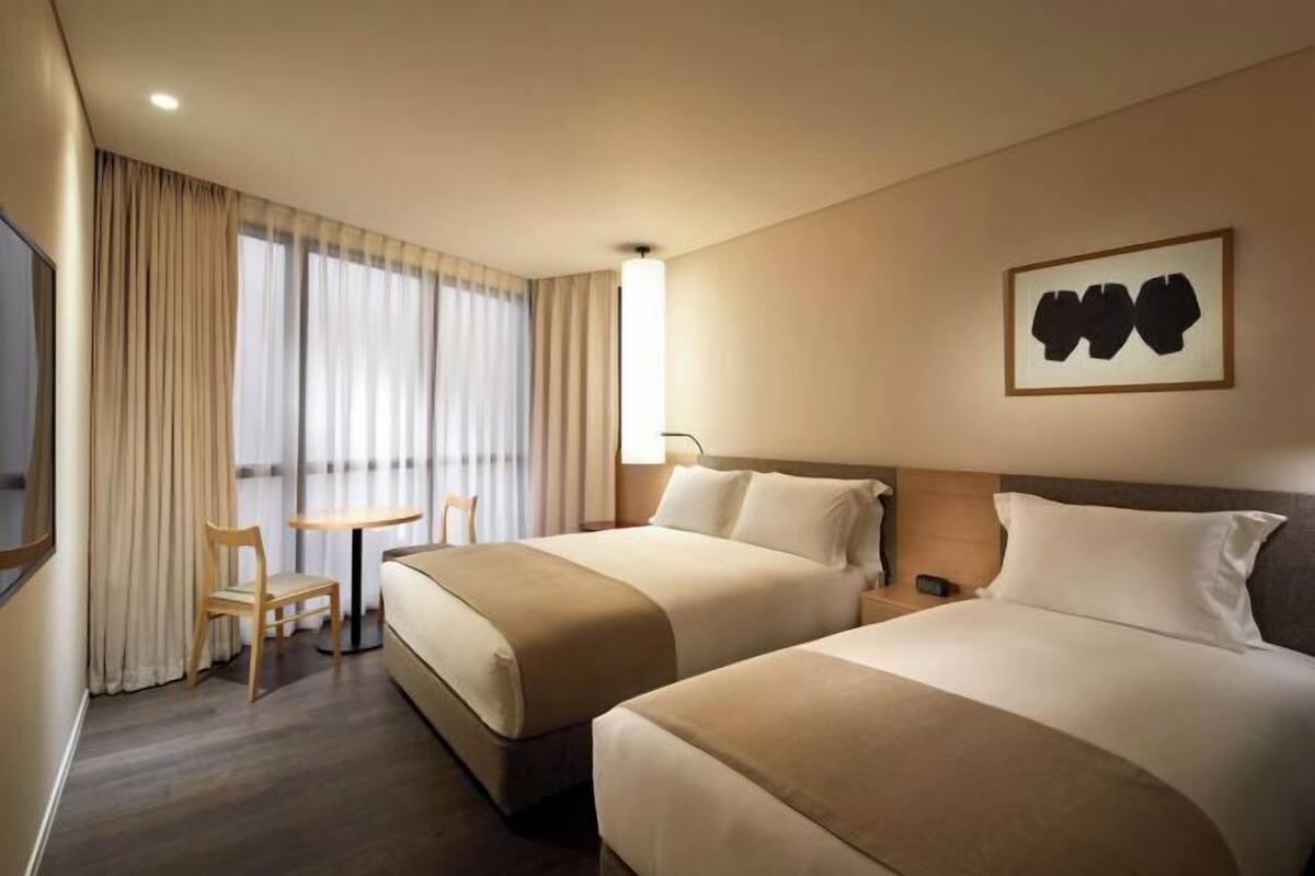 Premium bedding, down comforters, in-room safe, desk