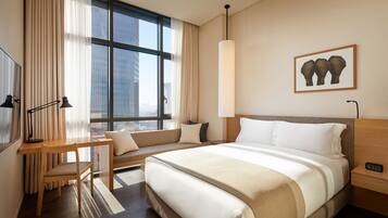 Premium bedding, down comforters, in-room safe, desk