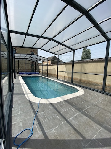 Large self-catering cottage with private, covered, heated swimming pool and Nordic bath.