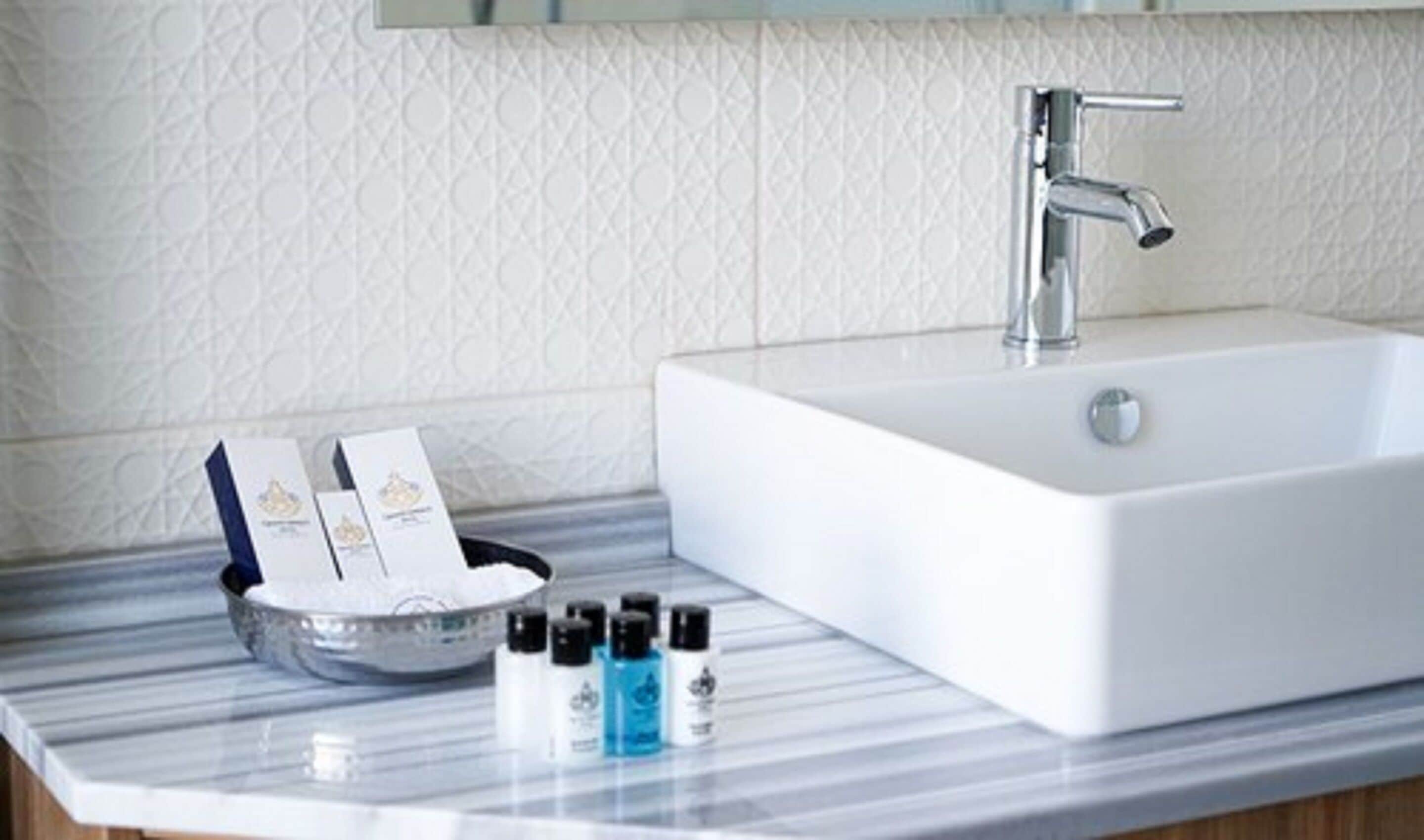 free toiletries, hair dryer, slippers, towels