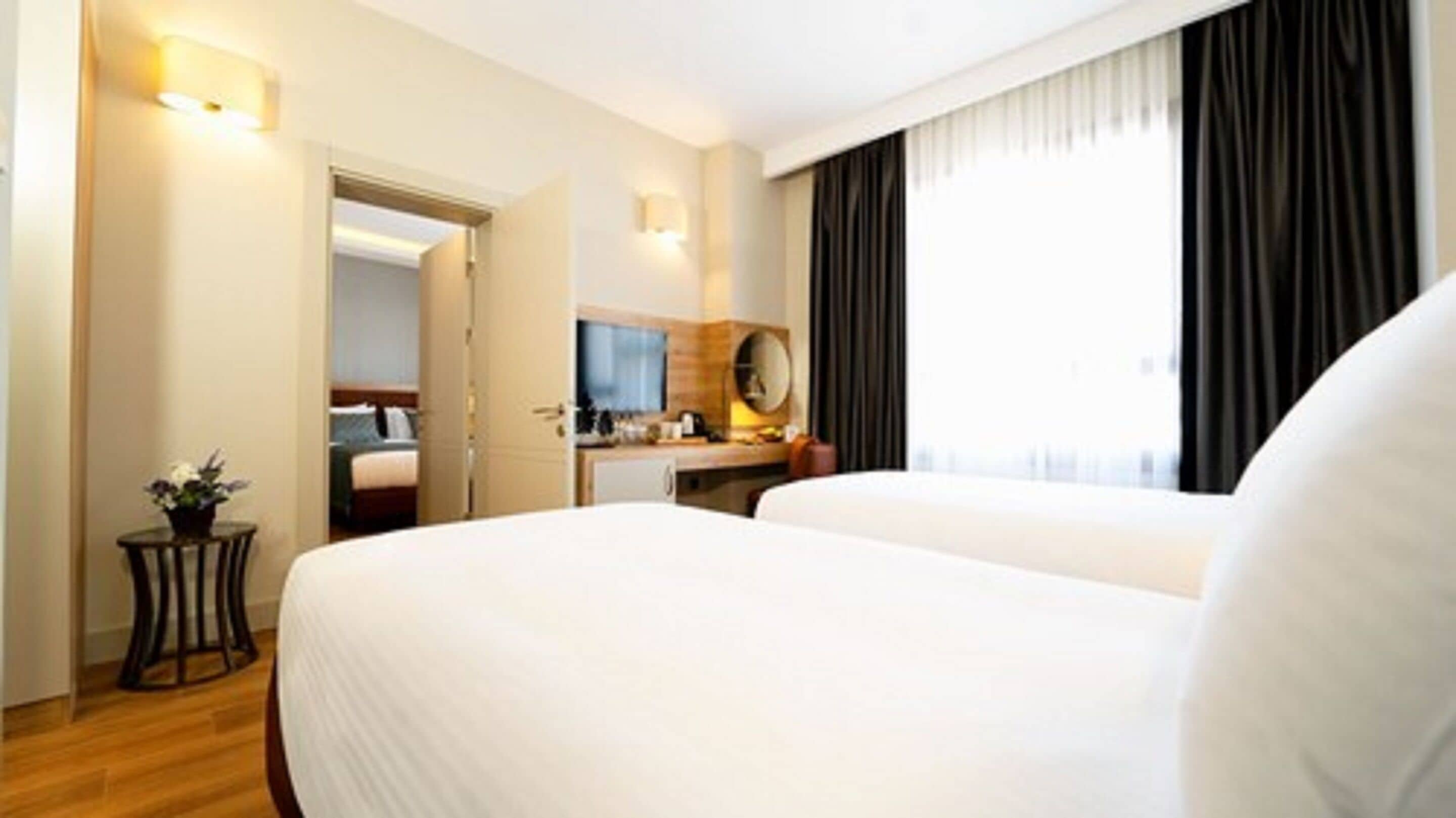 family room | 2 bedrooms, premium bedding, select comfort beds, in-room safe