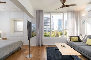 Appartement | Coin séjour | Télévision à écran plat de 32 pouces avec chaînes par satellite