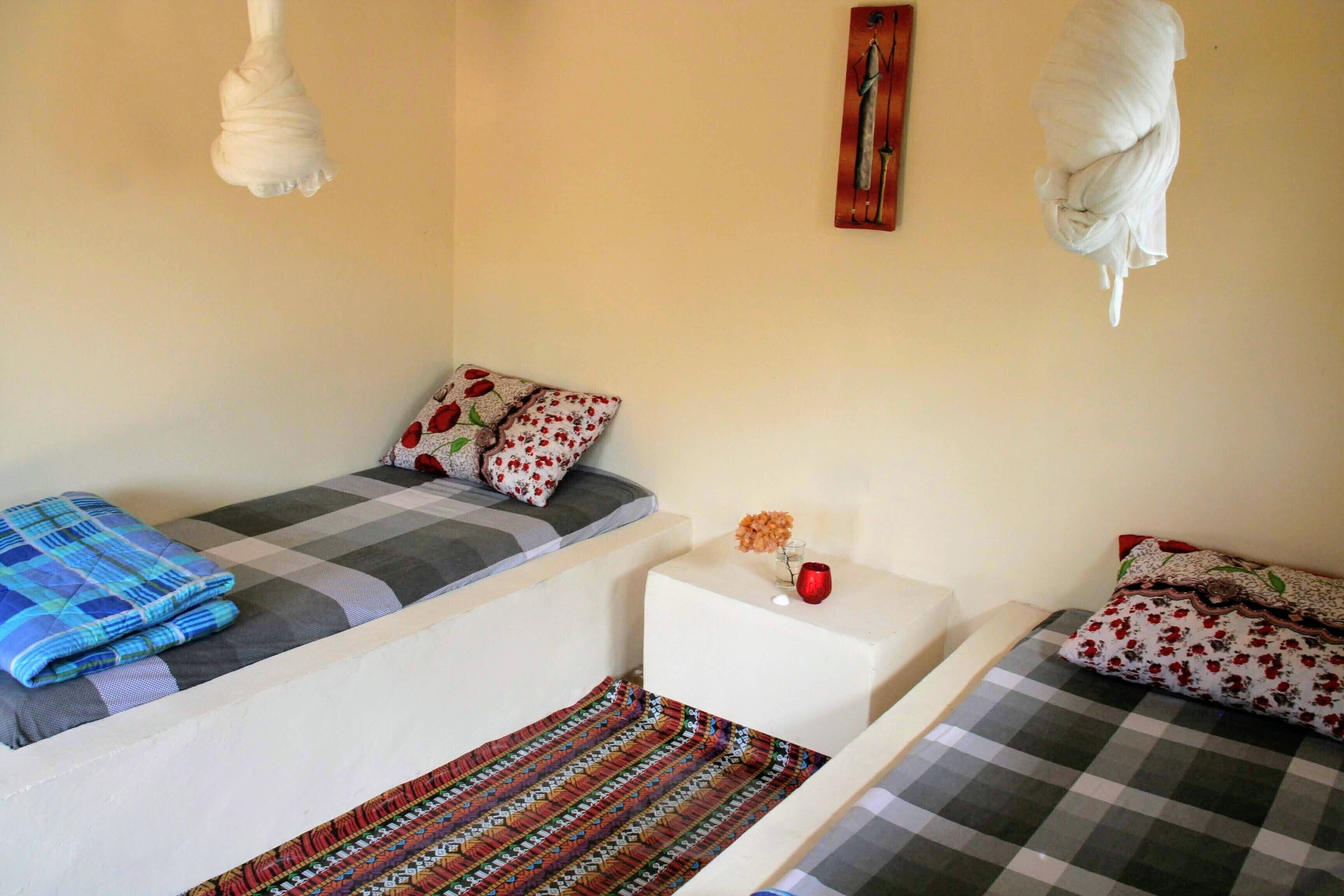 Basic Twin Room, Shared Bathroom | Blackout drapes, bed sheets