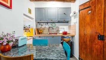 Fridge, coffee/tea maker, electric kettle, toaster