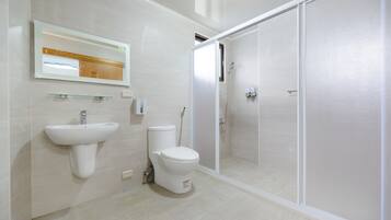 Shower, free toiletries, hair dryer, slippers