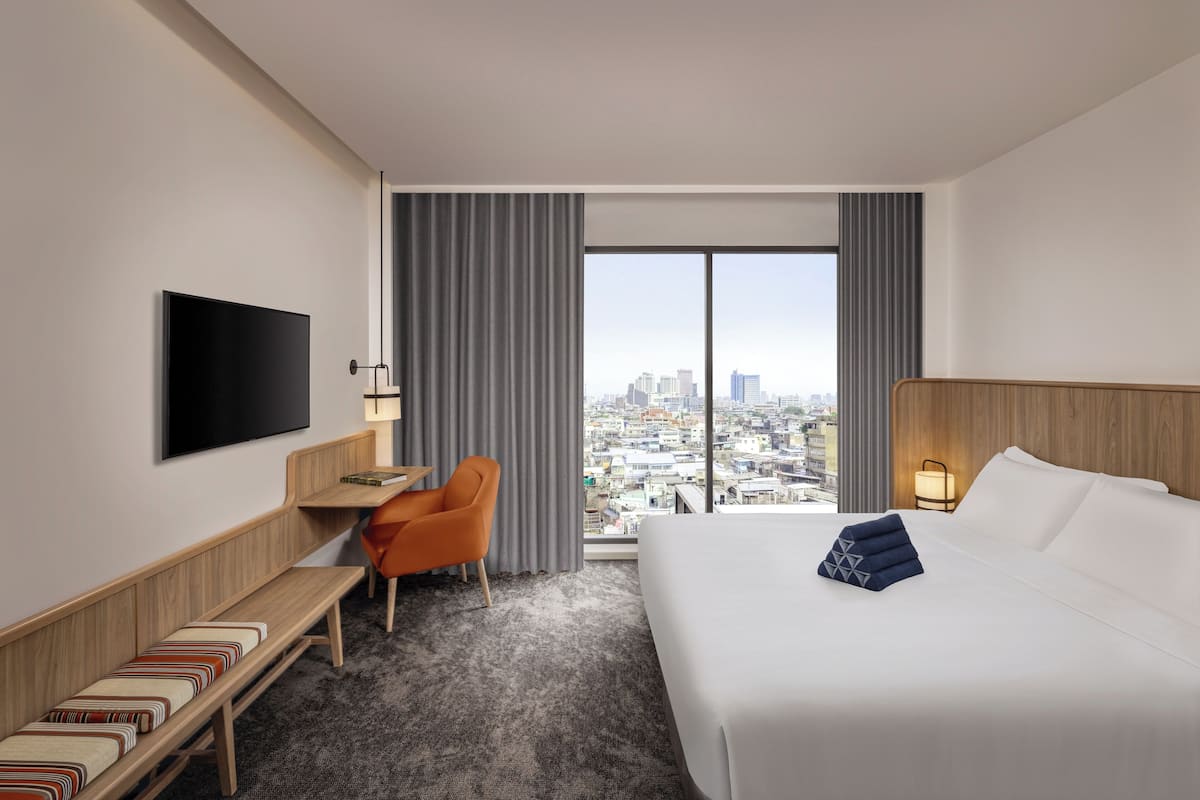 客房, 1 张特大床 (Roomy King City) | 客房内保  险箱、办公桌、笔记本电脑工作区、隔音